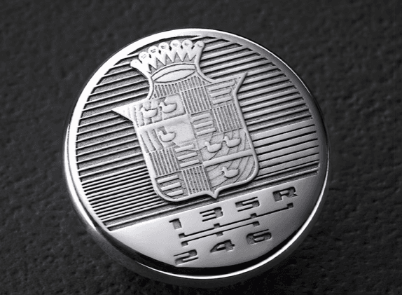 Machined automotive shift-knob medallion